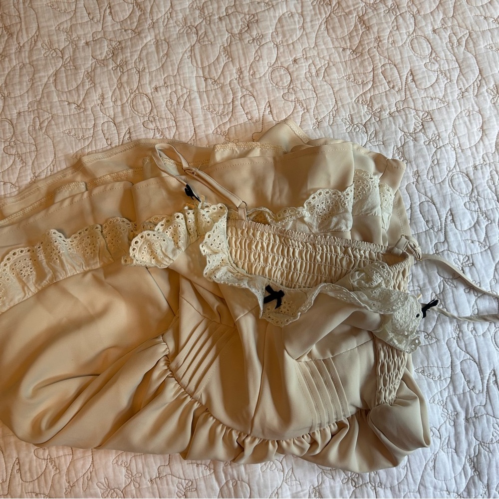 Cute cream mini dress with adorable ribbons detail